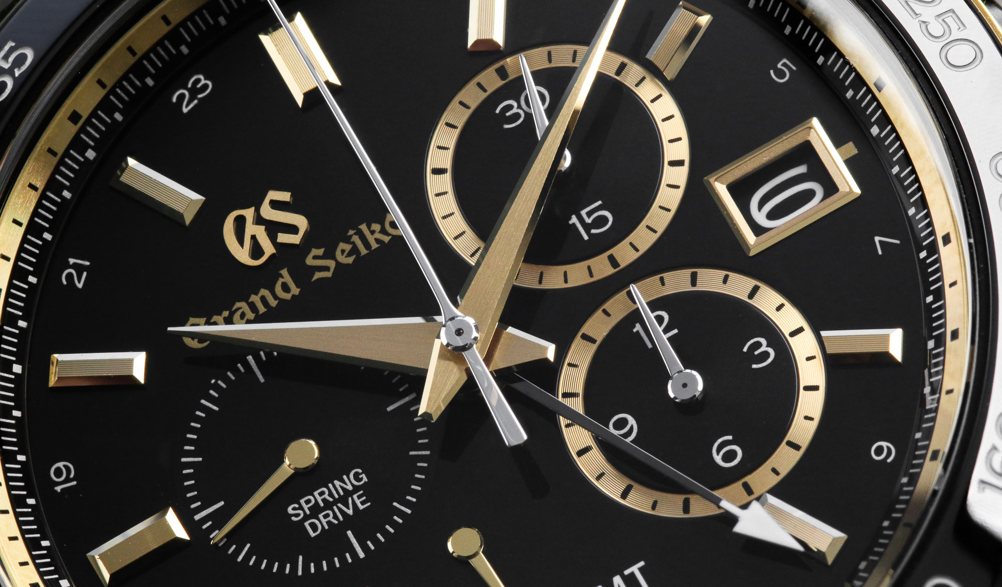 Grand Seiko SBGC240 black dial with golden accents macro