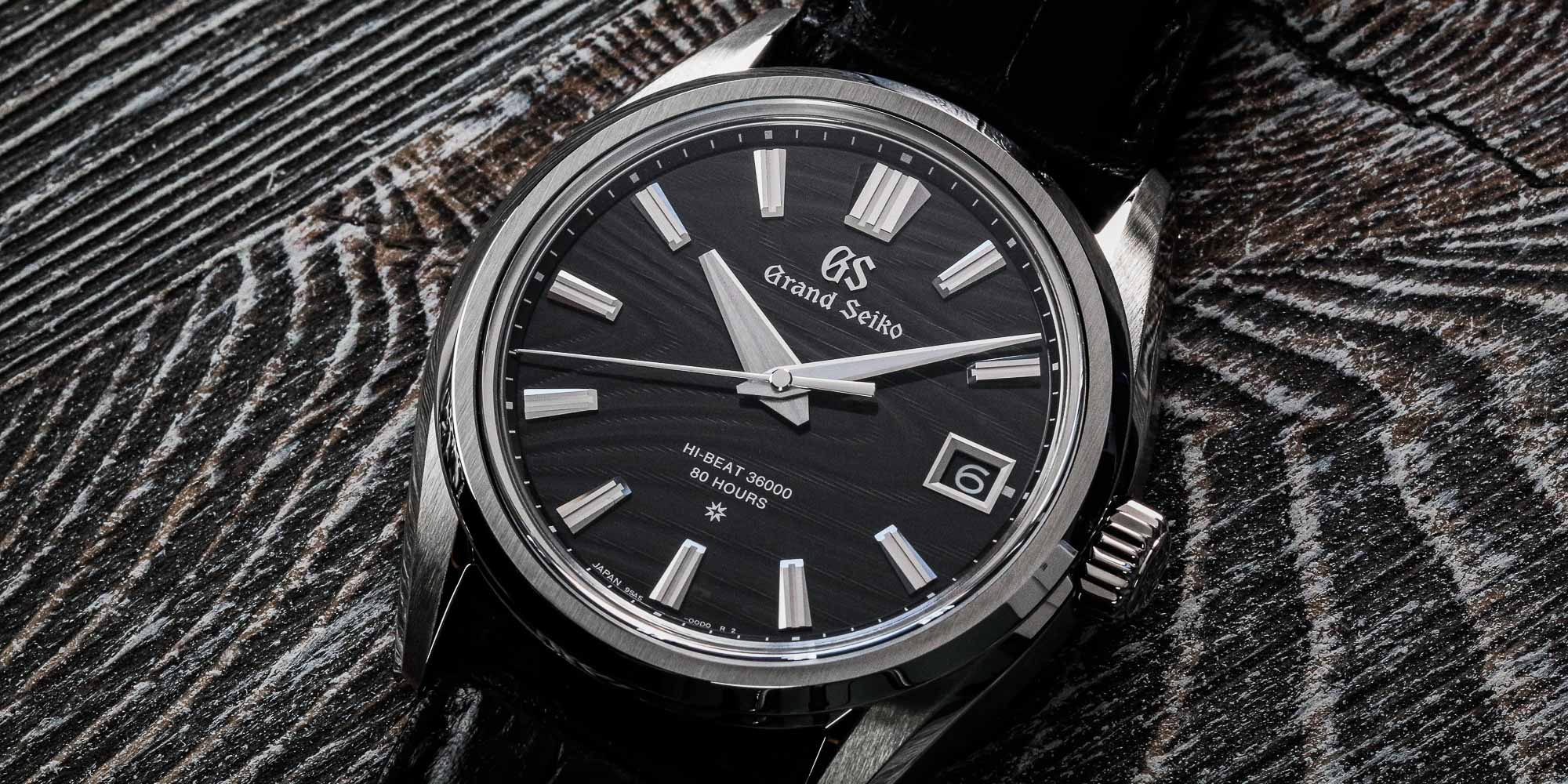 Grand Seiko SLGH007 dark dial stainless steel wristwatch.