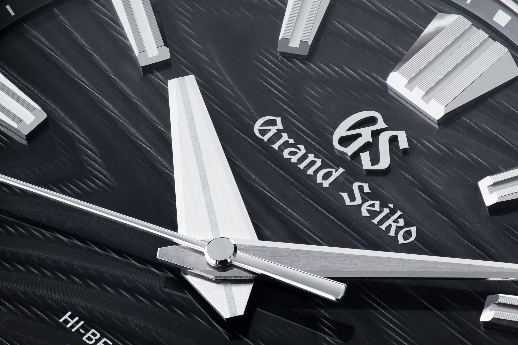 Grand Seiko SLGH007 dark dial stainless steel wristwatch.